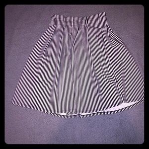 Vertically striped black skater skirt